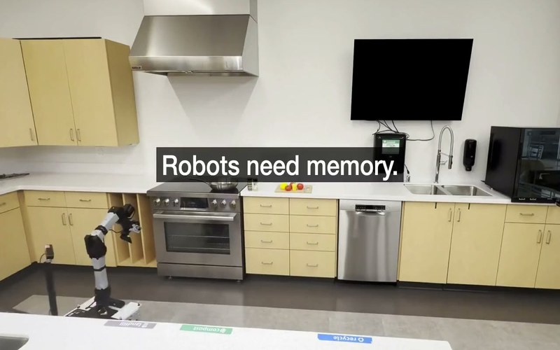 A mobile manipulator in a kitchen, captioned "Robots need memory."